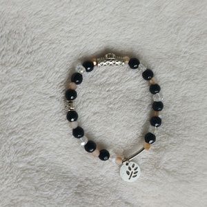 3 for 10) rubber band bracelets.